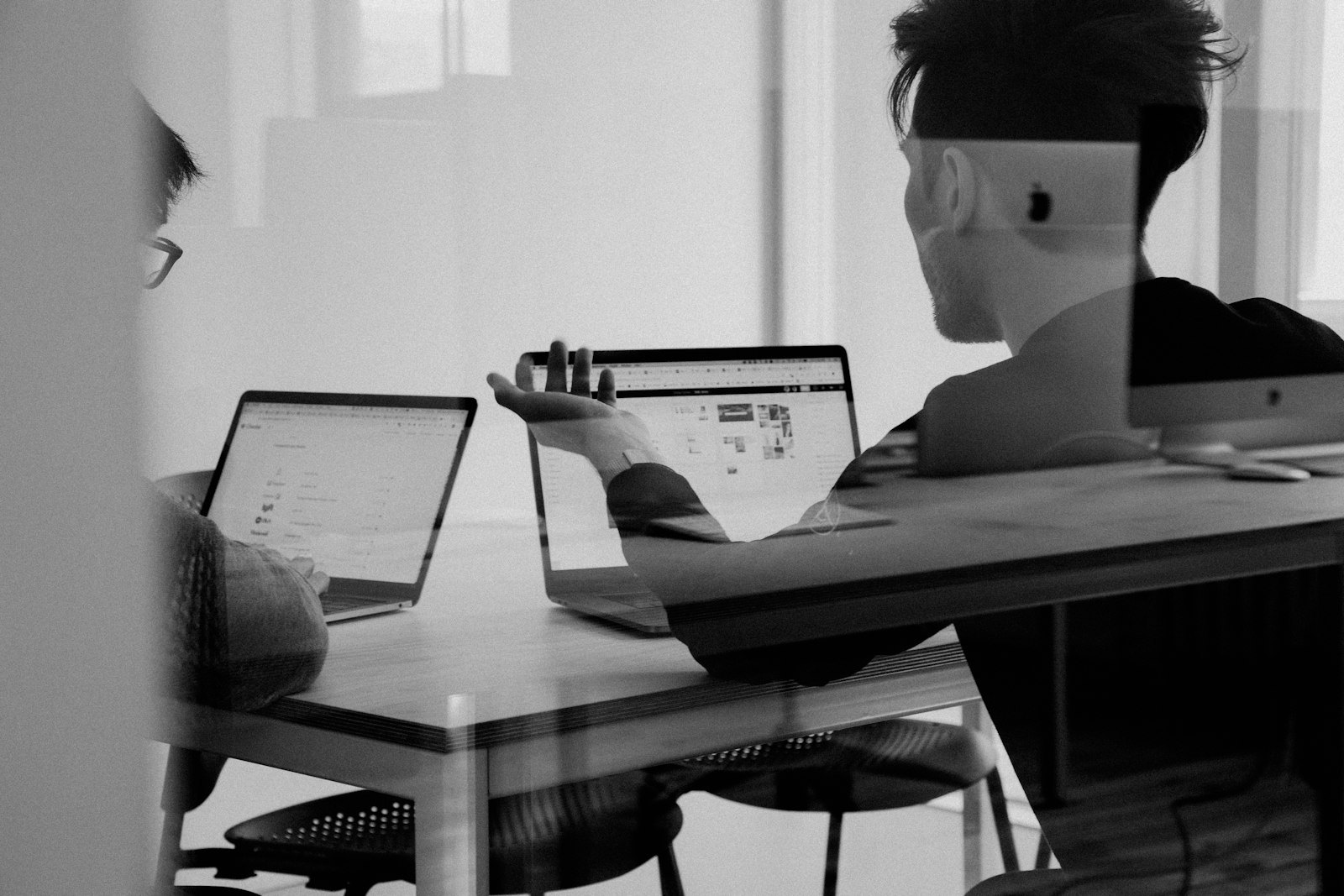 A team planning around a meeting table